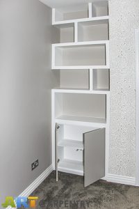 Contemporary style alcove bookshelves with cupboard, built in and hand painted in estate eggshell