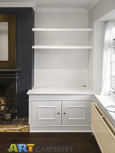 Traditional style alcove fitted TV cabinets with chunky and open shelving