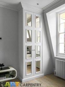 A gorgeous wardrobe with mirrored doors