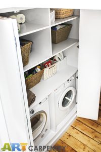 Laundry wardrobe with bi-folding doors. Includes space for laundry, washing machine, dryer, boiler and ect.