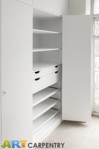 Bi-folded Doors Huge Contemporary Style Fitted Wardrobe.