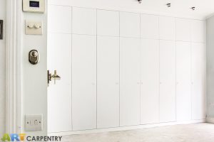 Bi-folded Doors Huge Contemporary Style Fitted Wardrobe.