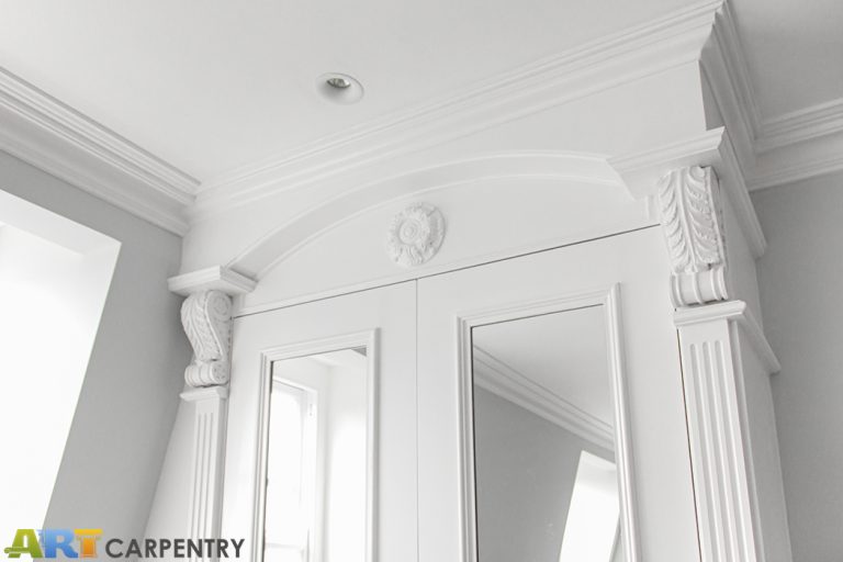 A gorgeous wardrobe with nice wood-carved corbels and French rosette