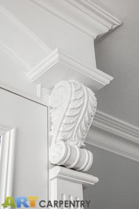 A gorgeous wardrobe with nice wood-carved corbels and French rosette